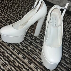 White platform pumps heels